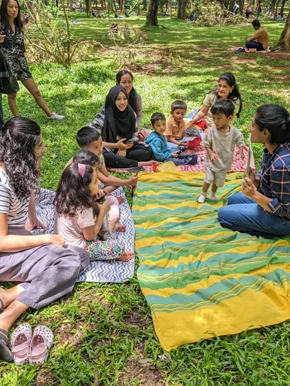 Photos from our 'Environment' week session. You can see the children learning about nature and conservation through engaging stories, right in the heart of nature itself.