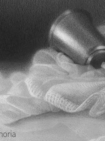 A close-up detail of the soft cloth, showing how I use an eraser and soft shading to create a gentle, atmospheric effect.