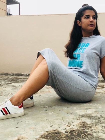 Athleisure is more than a trend; it's a lifestyle. For this client, we created a comfortable yet stylish at-leisure look with a coordinated t-shirt dress and classic white sneakers. It's about looking put-together even on your most casual days.