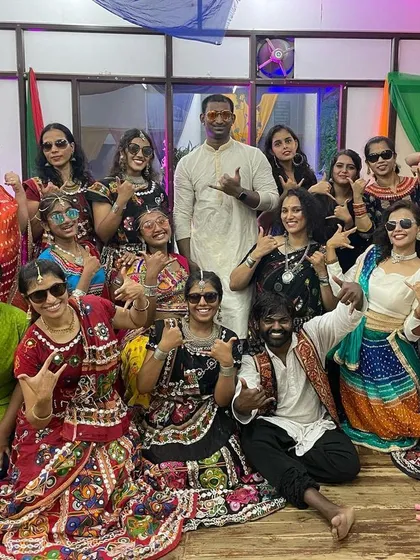 Adding a cool twist to our traditional wear. It's all about having fun and expressing our unique style.