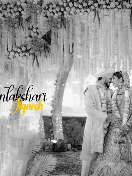 A creative black and white portrait with a splash of color on the couple's names, adding a modern graphic touch to a classic wedding photo.