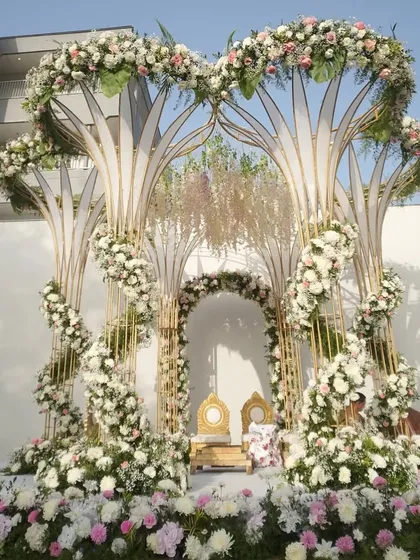 This unique mandap, designed to look like intertwined trees of life, showcases my passion for creating artistic, modern, and symbolic structures for your vows.