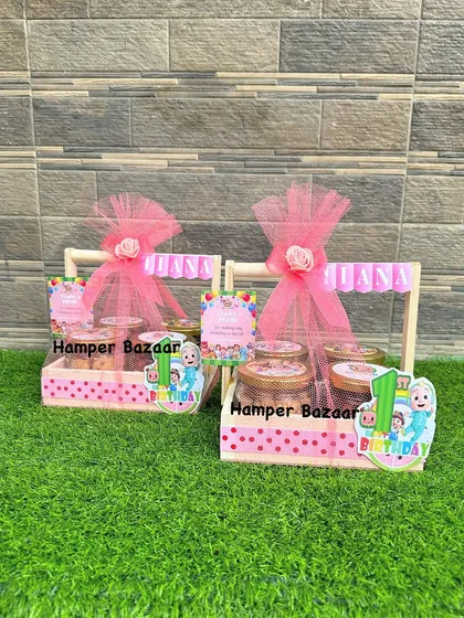 These Cocomelon cart hampers are a fun and unique way to present return gifts.