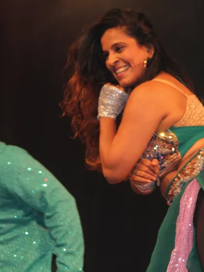 The pure joy of being on stage. This is me in my element, lost in the music and movement. This is the passion I bring to every performance I choreograph and every class I teach.