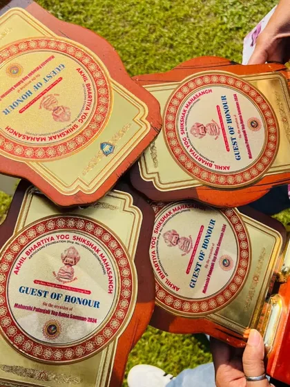 A collection of 'Guest of Honour' plaques from the Akhil Bhartiya Yog Shikshak Mahasangh, an honor for my students.