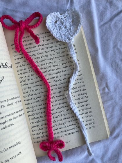 A closer look at my coquette bow and heart bookmarks. These are perfect for anyone who loves a romantic, aesthetic vibe and make for a thoughtful, handmade gift.