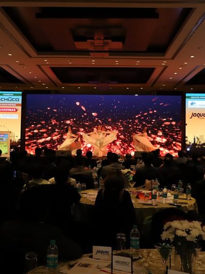 A full view of a conference hall during a presentation. I managed the AV production and stage setup, ensuring a seamless and professional experience for both the speakers and the audience.