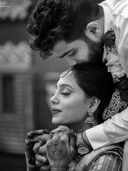 A tender, intimate black and white portrait capturing the deep connection between the couple.