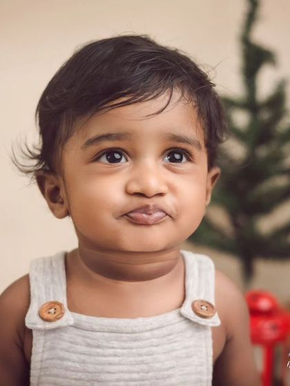 Even when they're not a fan of the cake smash, we find ways to capture their adorable personality, like this sweet little pout.