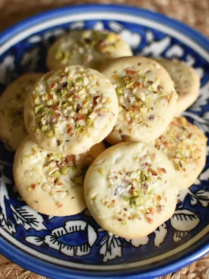 A close-up of my Almond Pista Cookies from the Desi Dazzle Basket. These buttery, melt-in-your-mouth cookies are inspired by classic Indian nan khatai.
