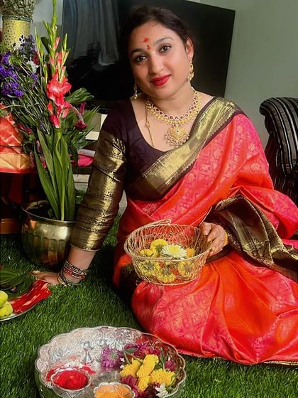 A beautiful portrait of our client during the festive celebrations, her vibrant saree reflecting her joyful spirit.