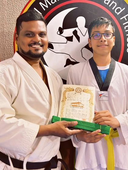 National Martial Arts and Fitness Academy - Kids Martial Arts & Fitness The Journey of Discipline: Belt Graduations photo 11