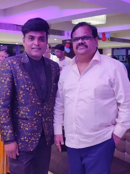 A photo with Deepak Bhau Nikalje, National President of the Republican Party of India, after performing at his grandson's birthday party in Navi Mumbai.