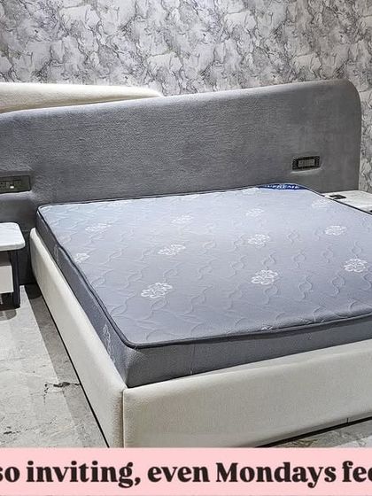 Another view of the modern bed with the asymmetrical headboard, showing how it fits perfectly into the client's space.