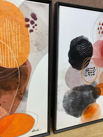 A close-up of the texture and color in these abstract artworks, enhanced by the clean, dark lines of the veneer wood floater frames.