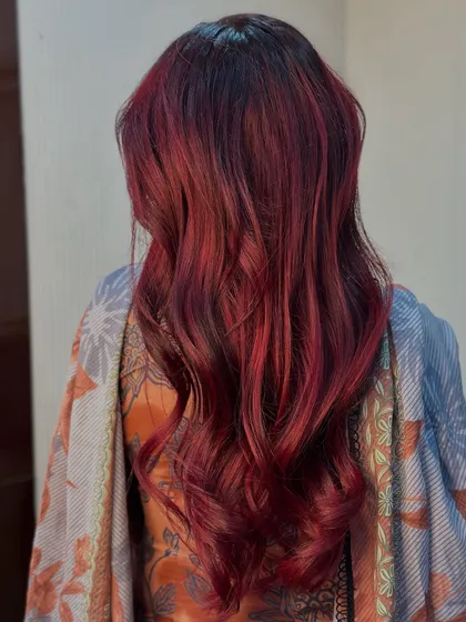 A beautiful, rich cherry red color that's perfect for making a statement. The soft waves add a touch of elegance.