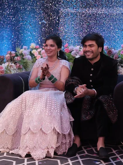 A happy shot of the couple enjoying their sangeet celebration.