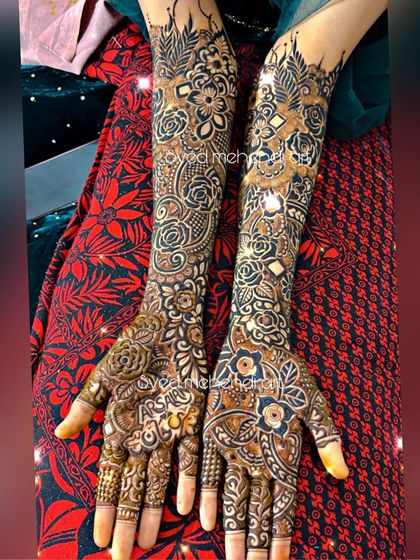 A classic full bridal design with symmetrical patterns and heavy coverage.