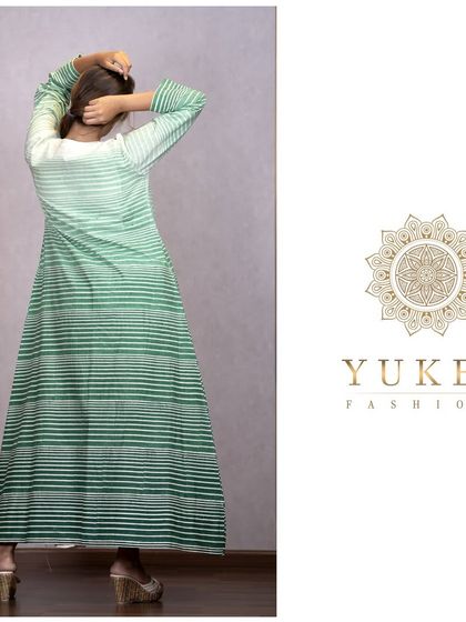 The back view of the striped green jacket, showing the beautiful ombre effect of the block printing.