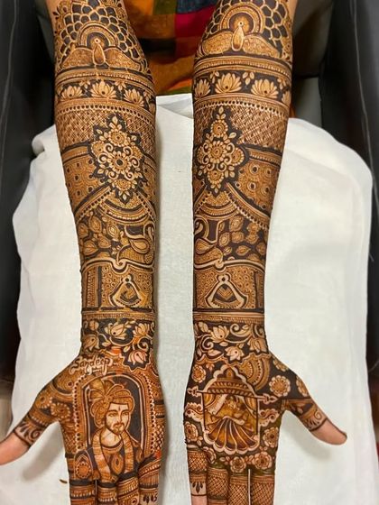 Another example of a detailed groom portrait, this time with a different style of turban and expression.