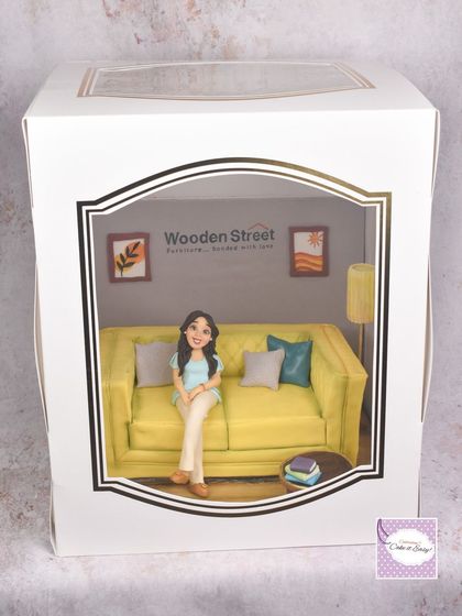 The sofa cake perfectly packed and ready for delivery.