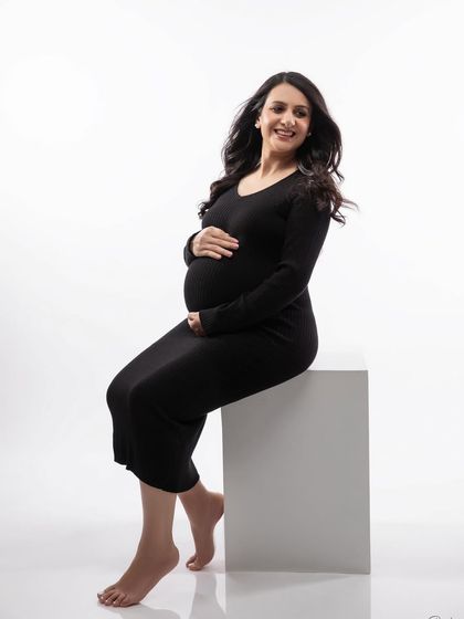 A joyful and relaxed seated pose. Even in a simple setup, we can capture so much personality and happiness.