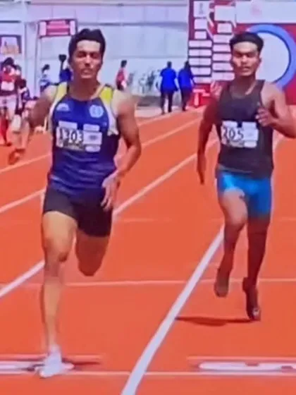 A close-up action shot of Jason Castelino during the 100m run at the 38th Junior National Athletics Championship, where he won a silver medal.