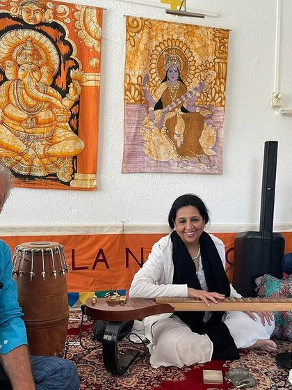 Posing with my bandmates after a successful first concert of our tour in Groningen. These collaborations are a key part of my musical journey, blending different sounds and cultures.