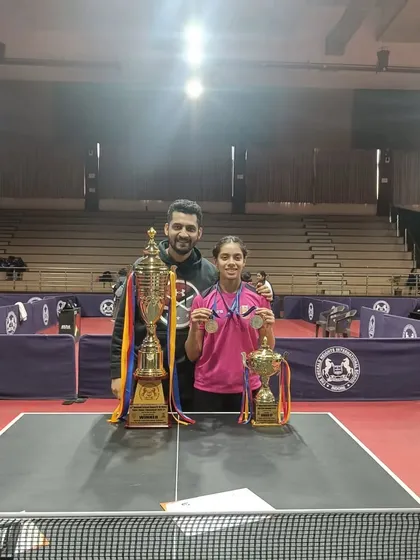 Another shot of me with Ananya at the SGFI games, a moment of shared pride and accomplishment. This reflects the close bond and teamwork between our coaches and players.