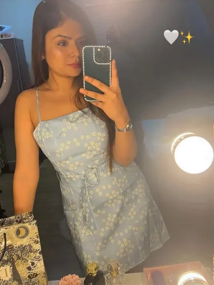 A simple and sweet look in a light blue floral dress.