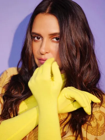 I love working with bold and unconventional pieces. Here, I styled Neha Dhupia in a unique printed dress from Huemn, paired with vibrant neon yellow gloves for a high-impact, artistic statement.