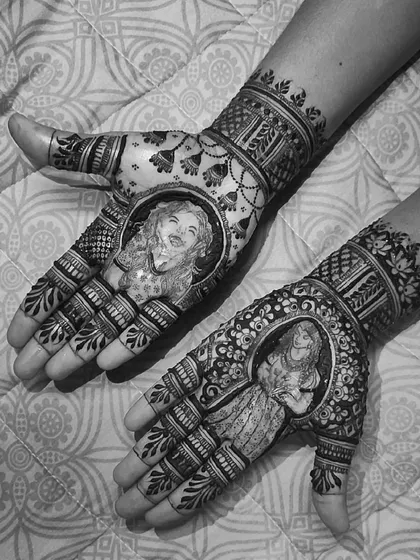 A black and white version of the joyful bride portraits. This emphasizes the contrast and detail in the figure work, from the expression on her face to the patterns on her clothing.
