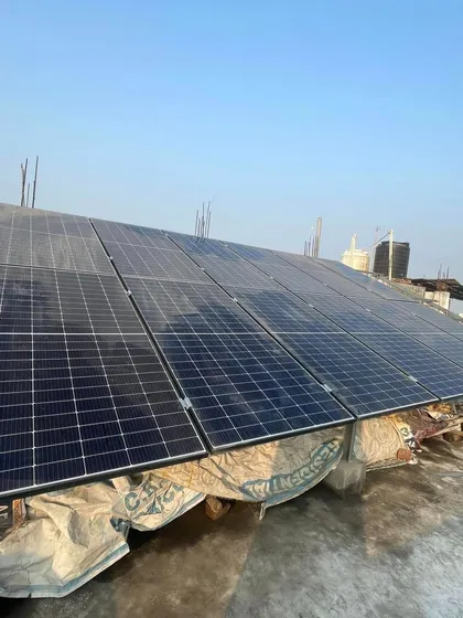 The solar panel array at the Begusarai school, ready to harness the sun's power. This installation is a practical lesson in renewable energy for the students and the community.