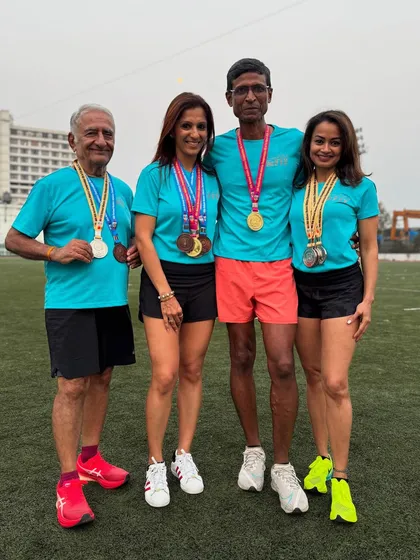 The team celebrating our founder's gold medal win at the national masters athletics championships. We train as a team and we celebrate as a team.