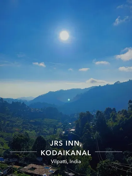 The stunning view from our stay at JRS Inn, Kodaikanal. I choose accommodations that offer breathtaking views of the hills.