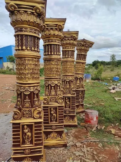 These are custom-made decorative pillars used for creating grand entrances and stages. The detailed, traditional design adds an element of grandeur to any event space.
