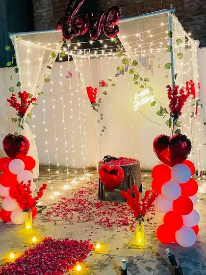 Another angle of the romantic terrace cabana setup, showing the cozy seating area inside, perfect for a private celebration for two.