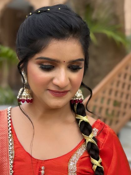 A close-up of the glittery eye makeup, showing the fine details and expert blending that create this captivating look.