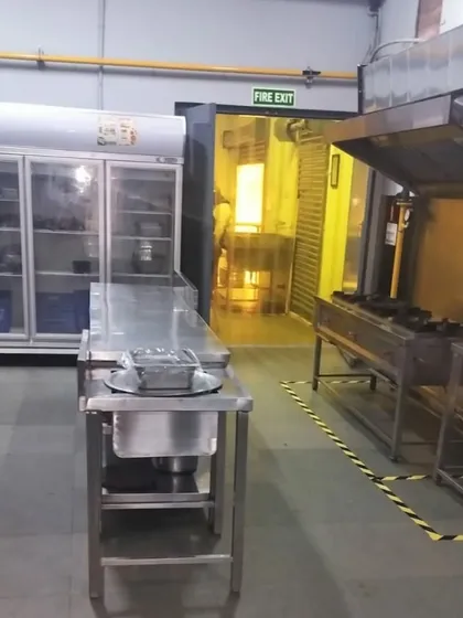 This is our professional-grade commercial kitchen, available for rent in Bangalore. It is fully equipped for high-volume cooking, featuring modern appliances, extensive workspace, and strict hygiene standards.