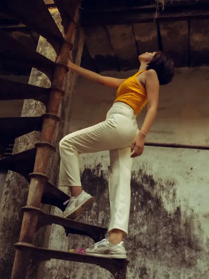 This set was shot around an old, rusty spiral staircase, using the location's texture and lines to create interesting compositions. The mix of color and B&W shows different ways to interpret the same scene.