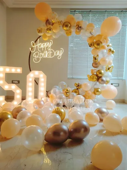 The combination of translucent, matte, and chrome balloons creates a beautiful, multi-dimensional effect.