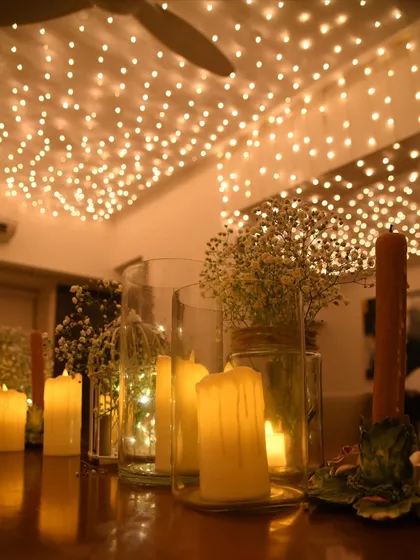 The warm glow from this setup proves you don't need harsh overhead lighting to create a beautiful ambiance. It's all about soft, layered light.