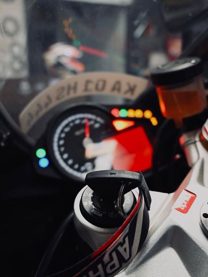 The view from the cockpit of the Aprilia RSV4, with the tachometer hitting the redline.