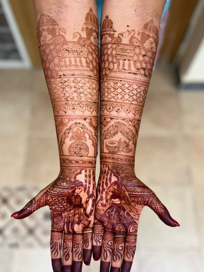 The stain of a customized Bridal Extravaganza design. The rich color brings out the mesmerizing details of the peacocks and bride-groom figures.