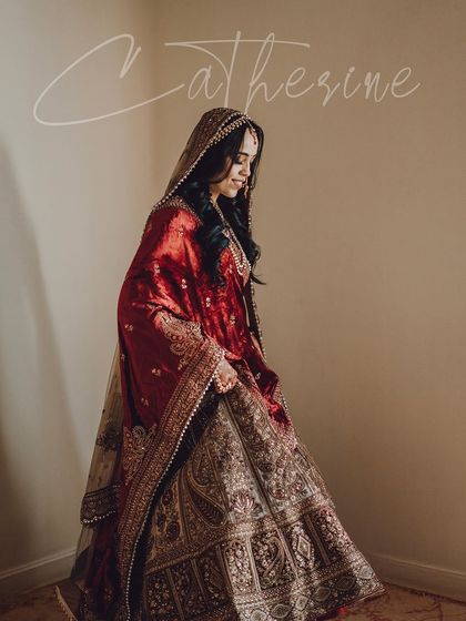 An elegant, full-length portrait of the bride with her name stylishly overlaid, perfect for an album cover.