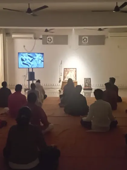 A view from the doorway during the Mauni Amavasya gathering. The stillness in the room was profound, as everyone sat together in silent communion.