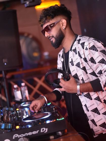 Confidence comes from preparation. Here I am, focused on the mix, ensuring every transition is perfect.