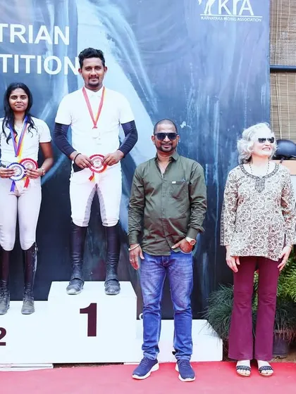 Another podium shot from the Karnataka State Equestrian Competition, with my riders proudly displaying their medals. Consistent winning is the hallmark of my training program.