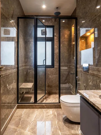 A duplicate image of the same modern bathroom, emphasizing the clean lines and the rich texture of the marble. This design turns an everyday routine into an extraordinary experience.