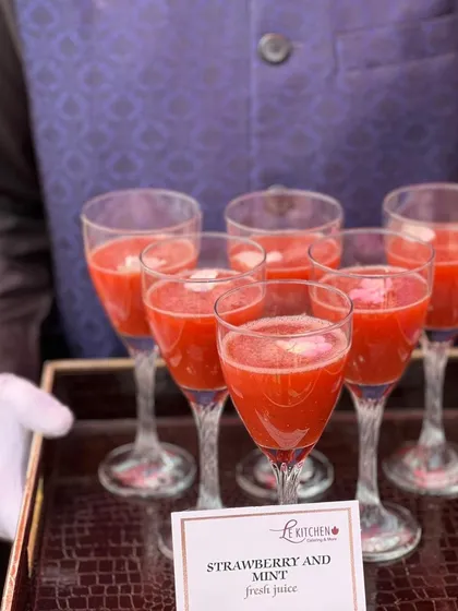 A tray of fresh Strawberry and Mint juice, a healthy and vibrant beverage option for any event.